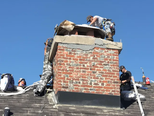 Black Forest Chimney Sweep installing a custom chimney crown in Black Forest, CO